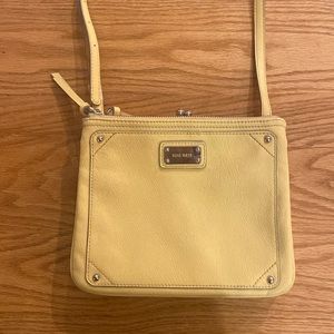 Nine West yellow cross body purse.